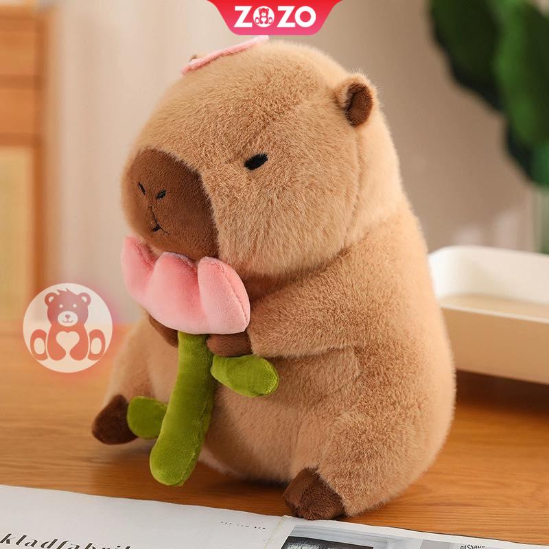 Gấu bông Capybara ôm hoa tươi