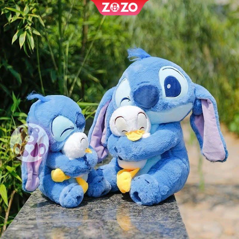 Gấu bông Stitch ôm vịt trắng đáng yêu